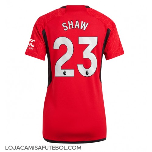 Camisa de Futebol Manchester United Luke Shaw #23 Equipamento Principal Mulheres 2023-24 Manga Curta